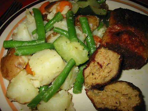 Chicken and pork kievs with steamed vegetables