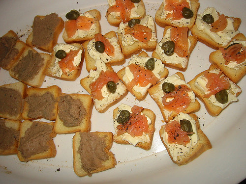 Pate on mini toast, cream cheese, smoked salmon and capers on mini toast