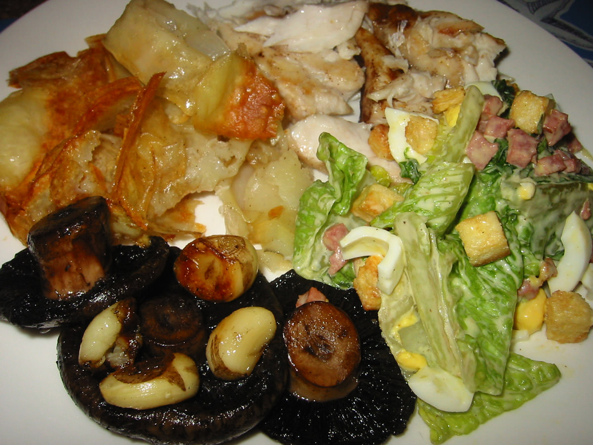 Snapper, caesar salad, potatoes and garlic mushrooms