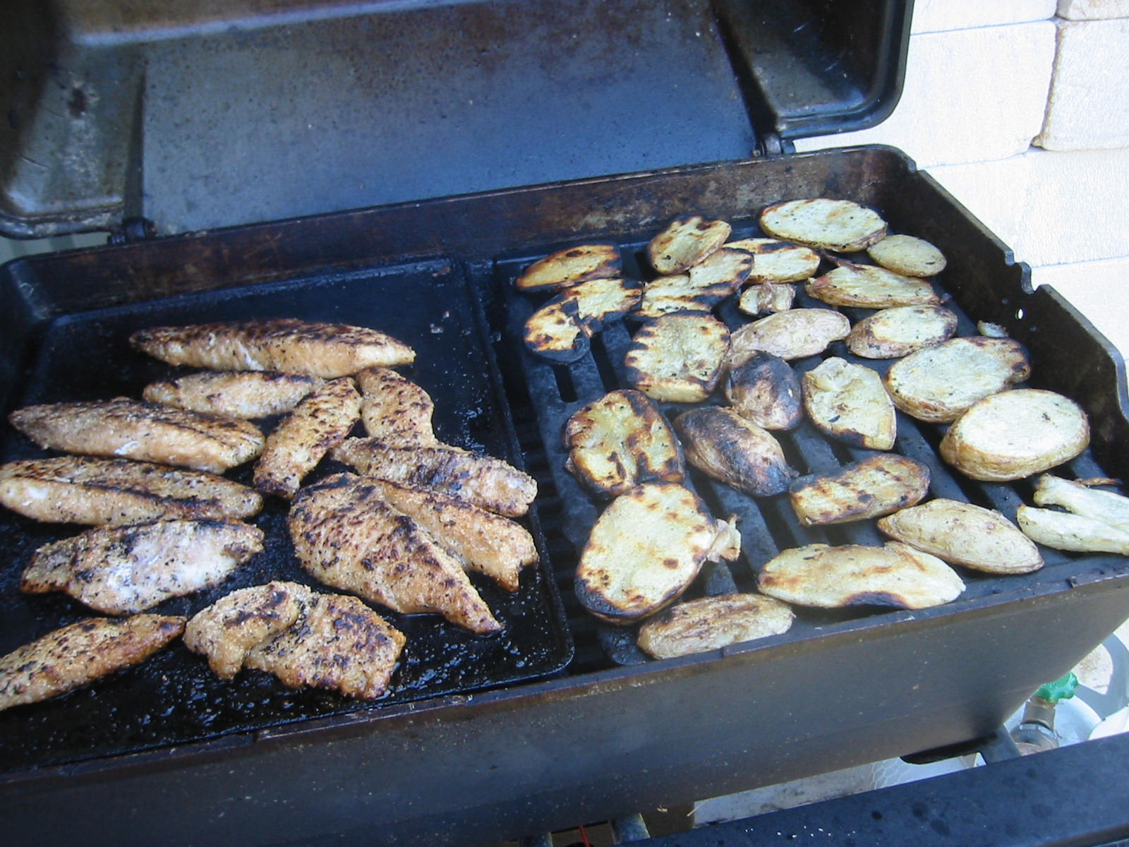 Fish and potatoes on the barbie