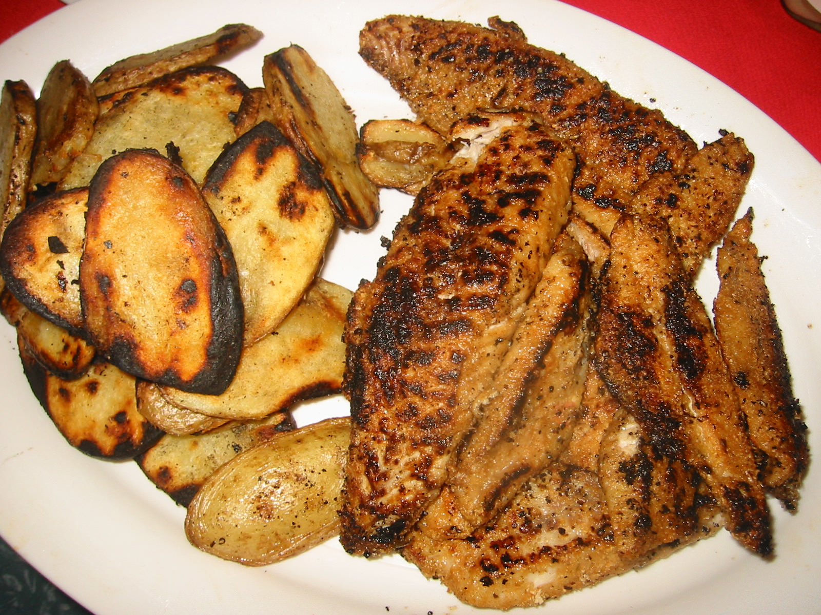 Barbecued potatoes and fish