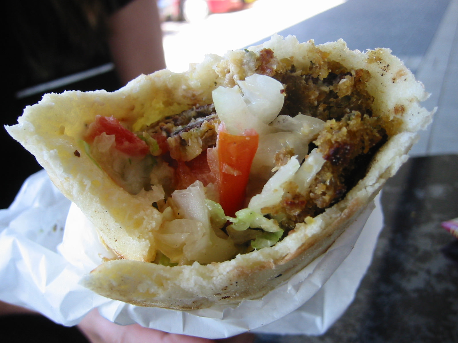 Falafel kebab with salad, hummus and garlic sauce