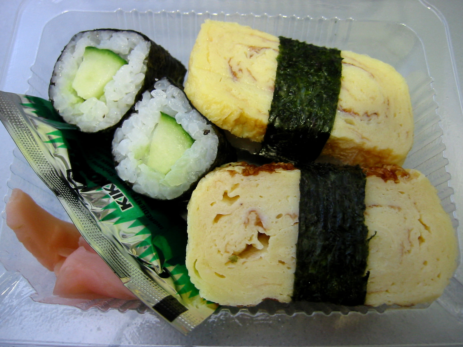 Tamago nigiri and cucumber sushi