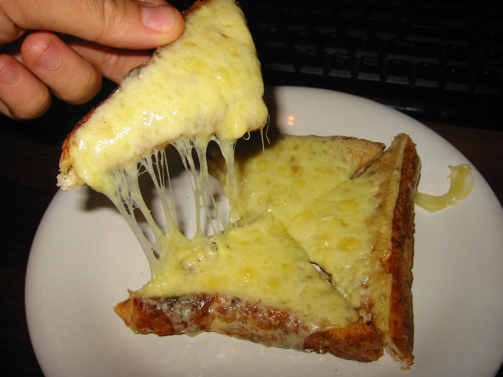 Grilled colby cheese on toast - stringy cheese