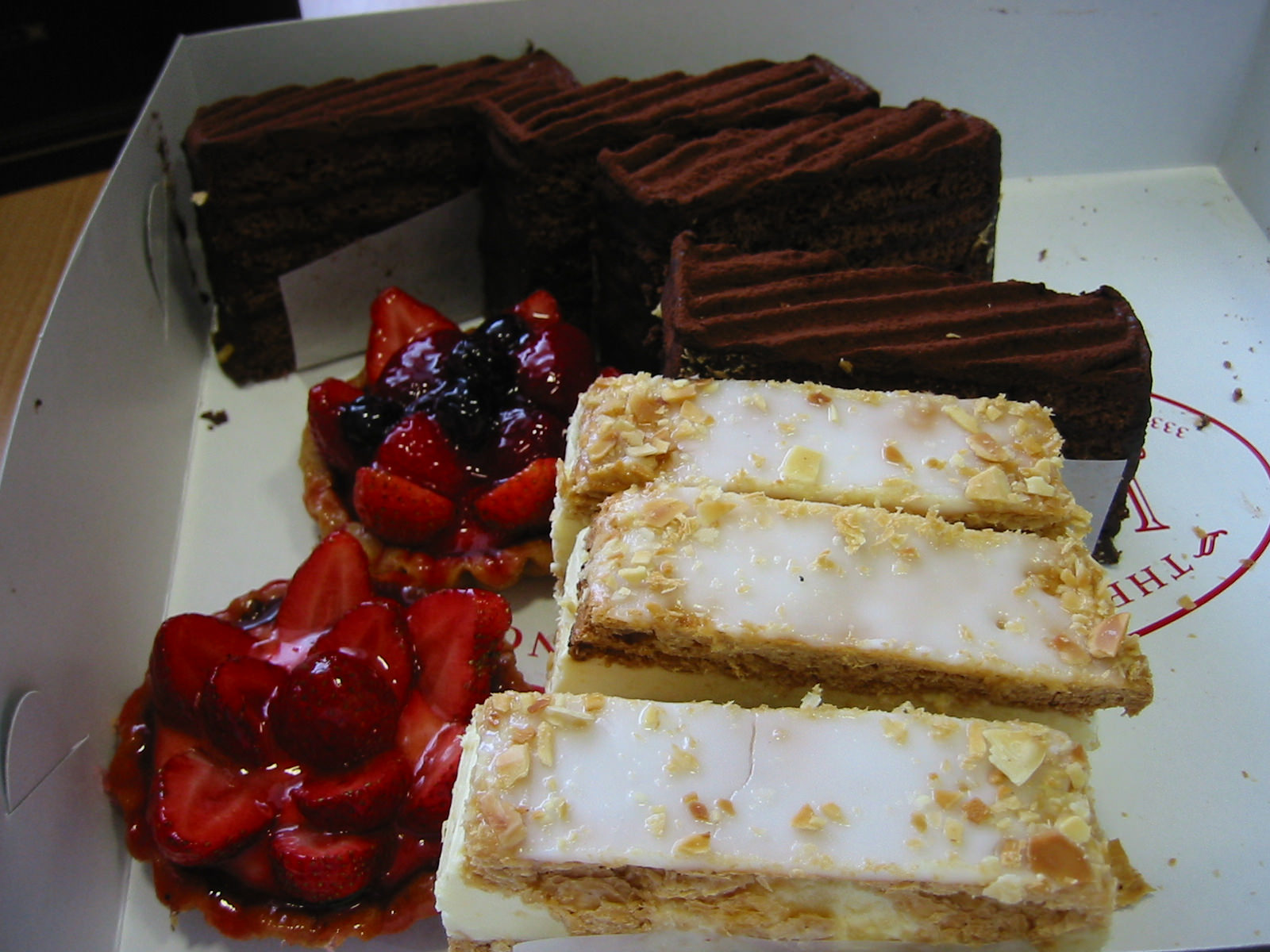 Vanilla slice, berry tarts and boozy chocolate cake