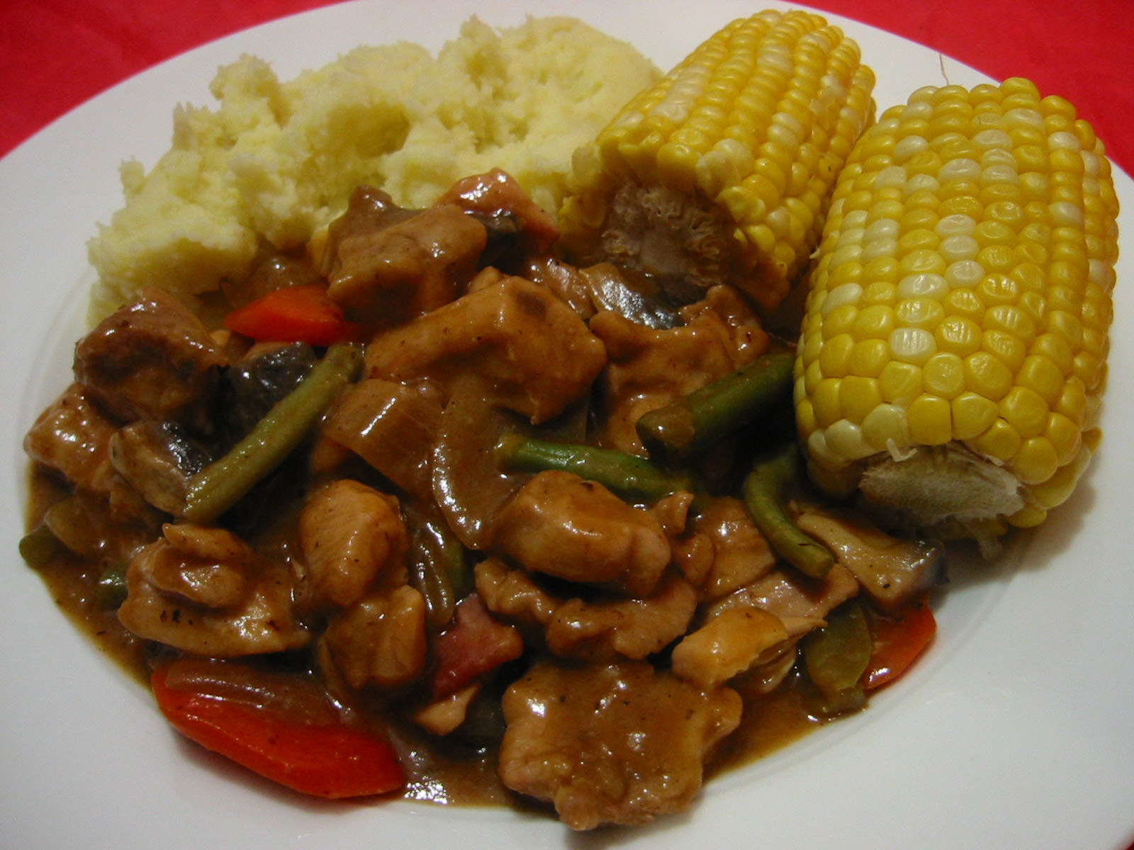 Chicken and mushroom casserole, mashed potatoes and corn