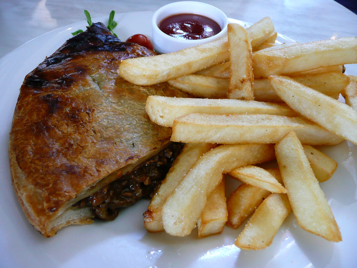 Organic beef pie with chips and tomato sauce