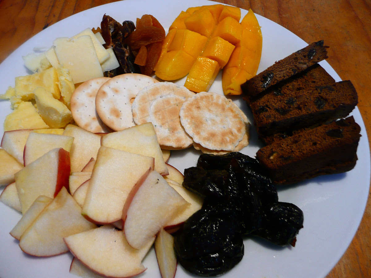 Cheese, crackers, fruit and cake