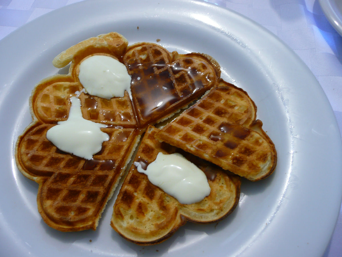 Waffles with maple syrup and cream