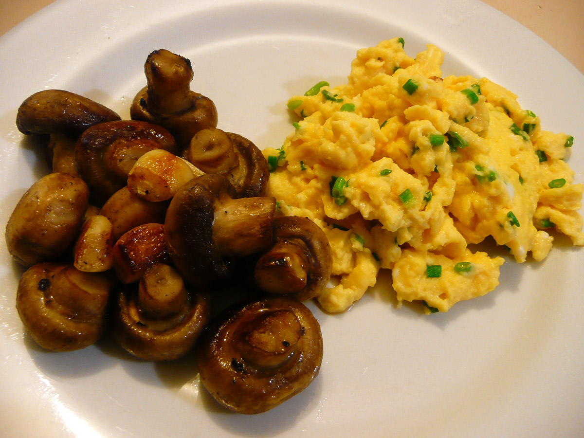 Garlic mushrooms and scrambled eggs with chives