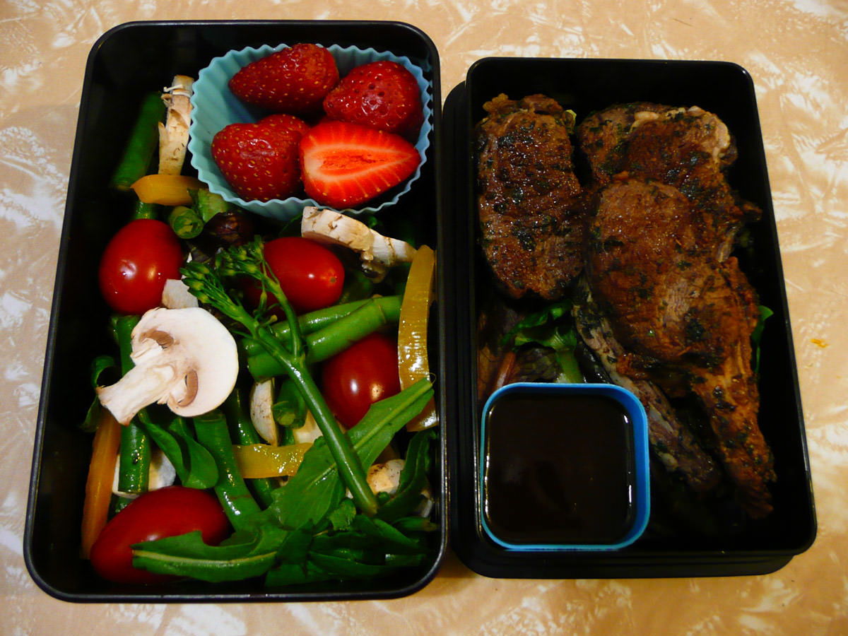 Lamb cutlets, salad and strawberries