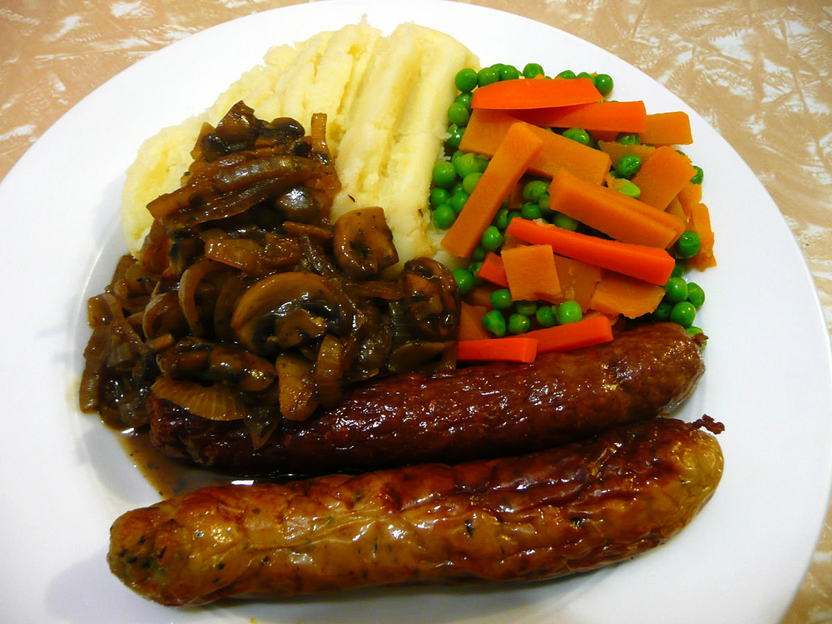 Bangers and mash, onion and mushroom gravy, peas, carrots and sweet potato
