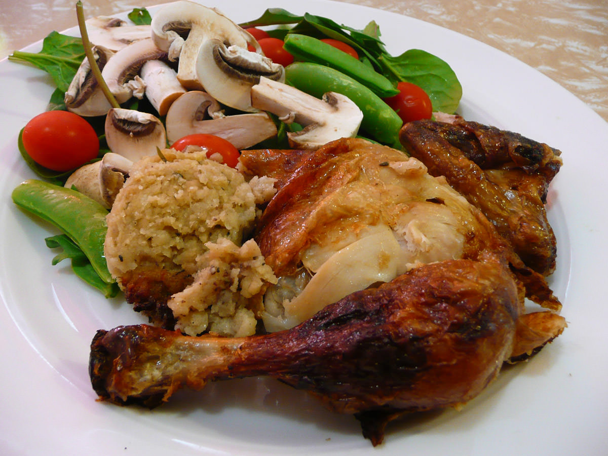 Barbecue chicken, stuffing and salad