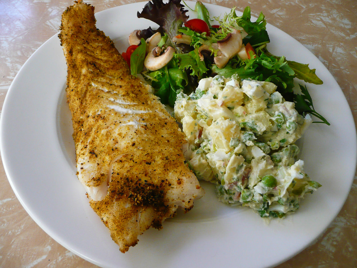 Lemon pepper fish, garden salad and potato salad