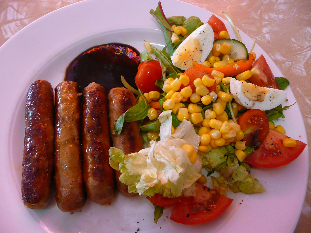 Sausages, salad and smokey BBQ sauce