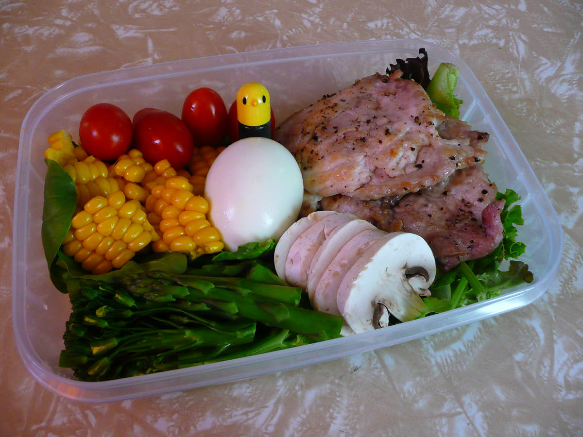 Bento - chicken escalopes, vegetables, salad and hard-boiled egg