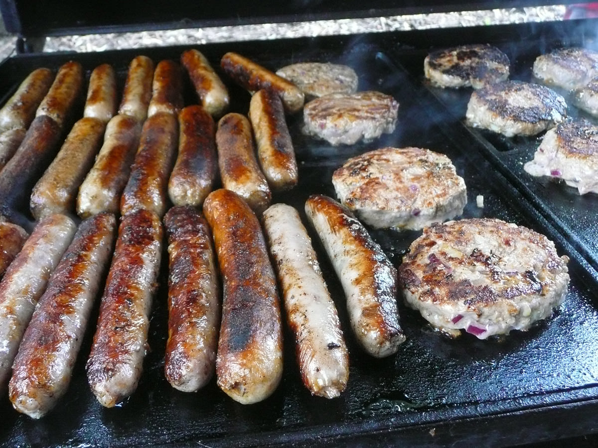 Sausages and burgers on the barbecue