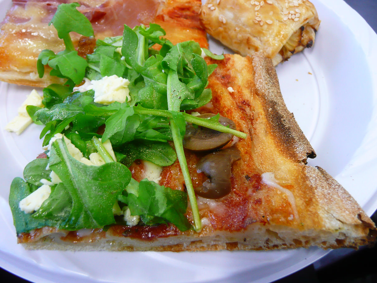 Rocket and olive pizza