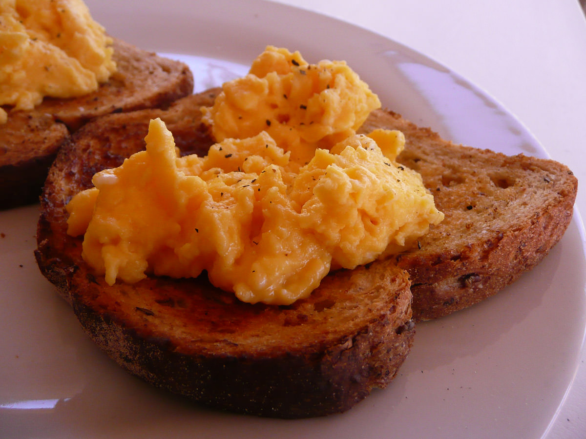 Scrambled eggs on toast close-up