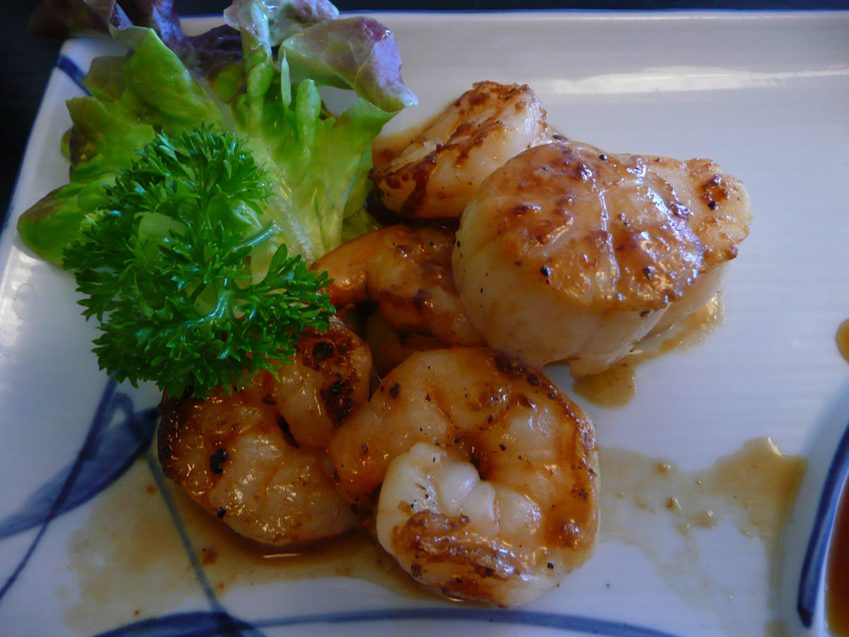 Seafood teppanyaki duo of scallop and prawn- close-up