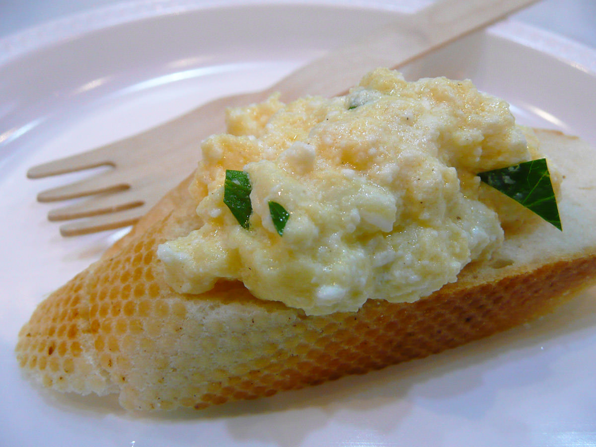 Scrambled eggs with creamed corn, parmesan and ricotta