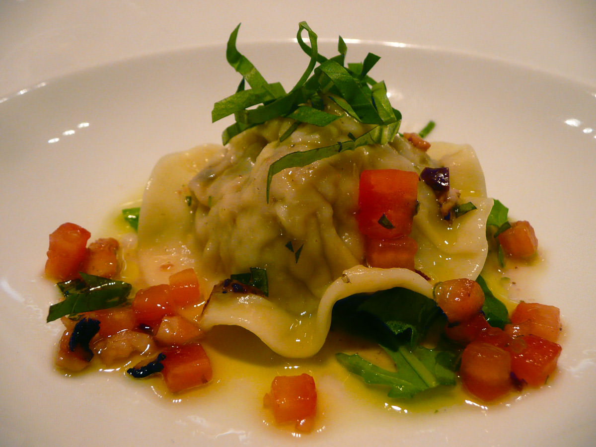 Raviolo of octopus with oregano and black olives