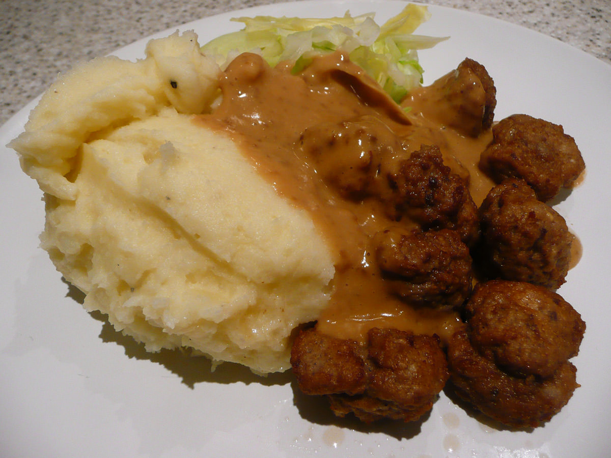 Swedish meatballs, cream gravy, mashed potatoes and steamed cabbage
