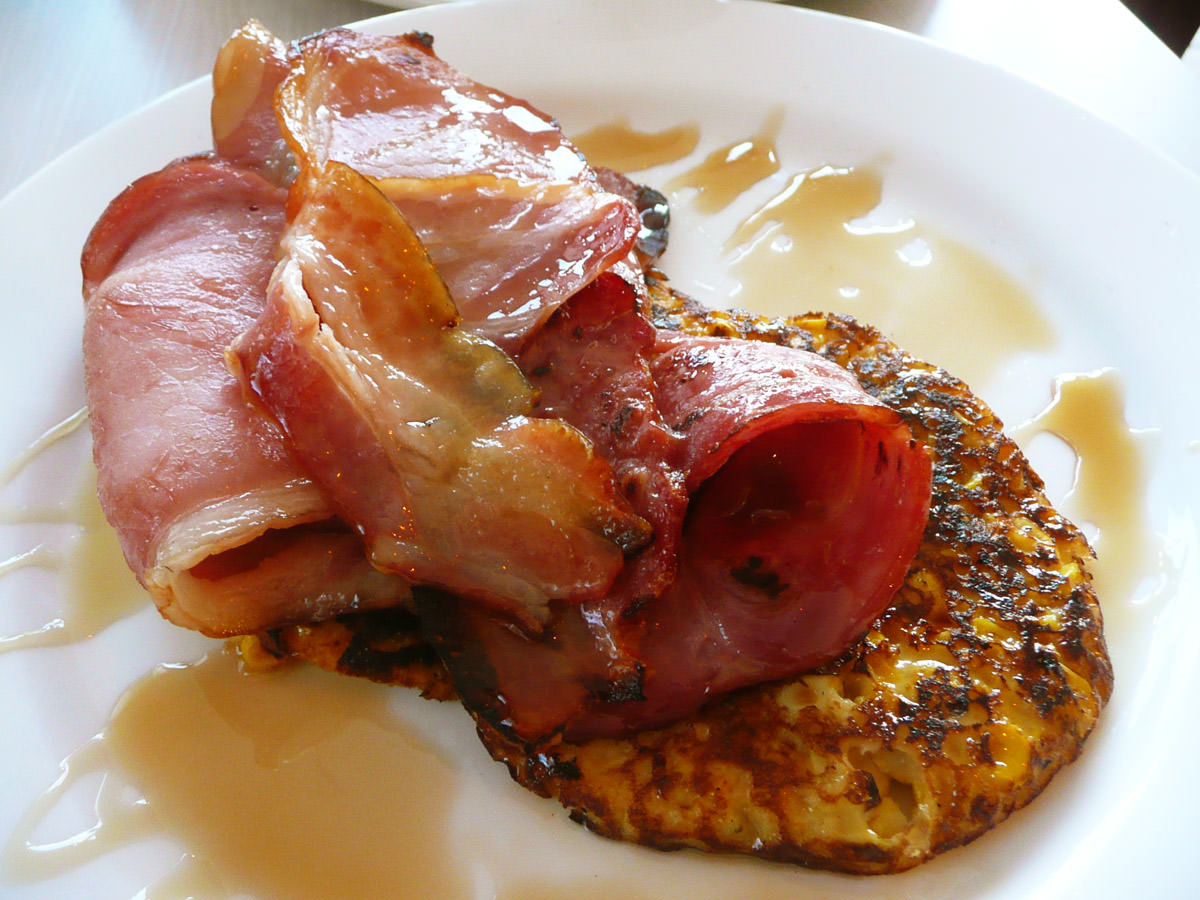 Corn fritters with bacon and maple syrup