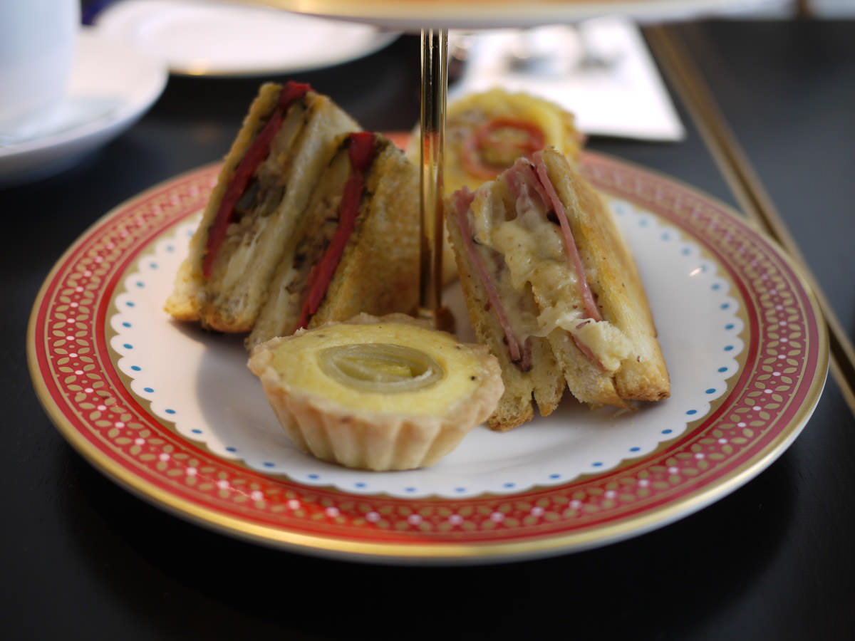 Bottom tier: hot mini toasted sandwiches and savoury tarts