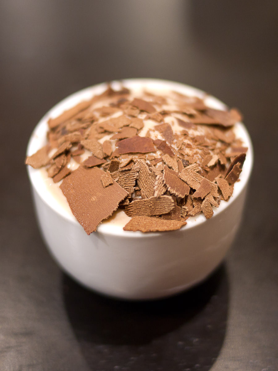 Milk chocolate ice cream with chocolate flakes