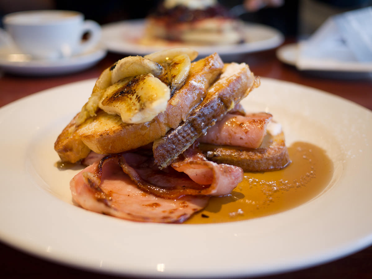 French toast, grilled bacon, banana and maple syrup (AU$19.50)