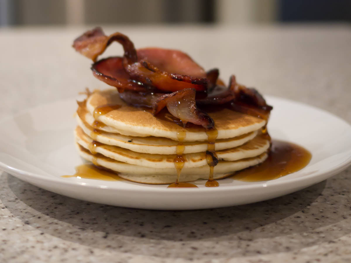 Pancakes with bacon and maple syrup.