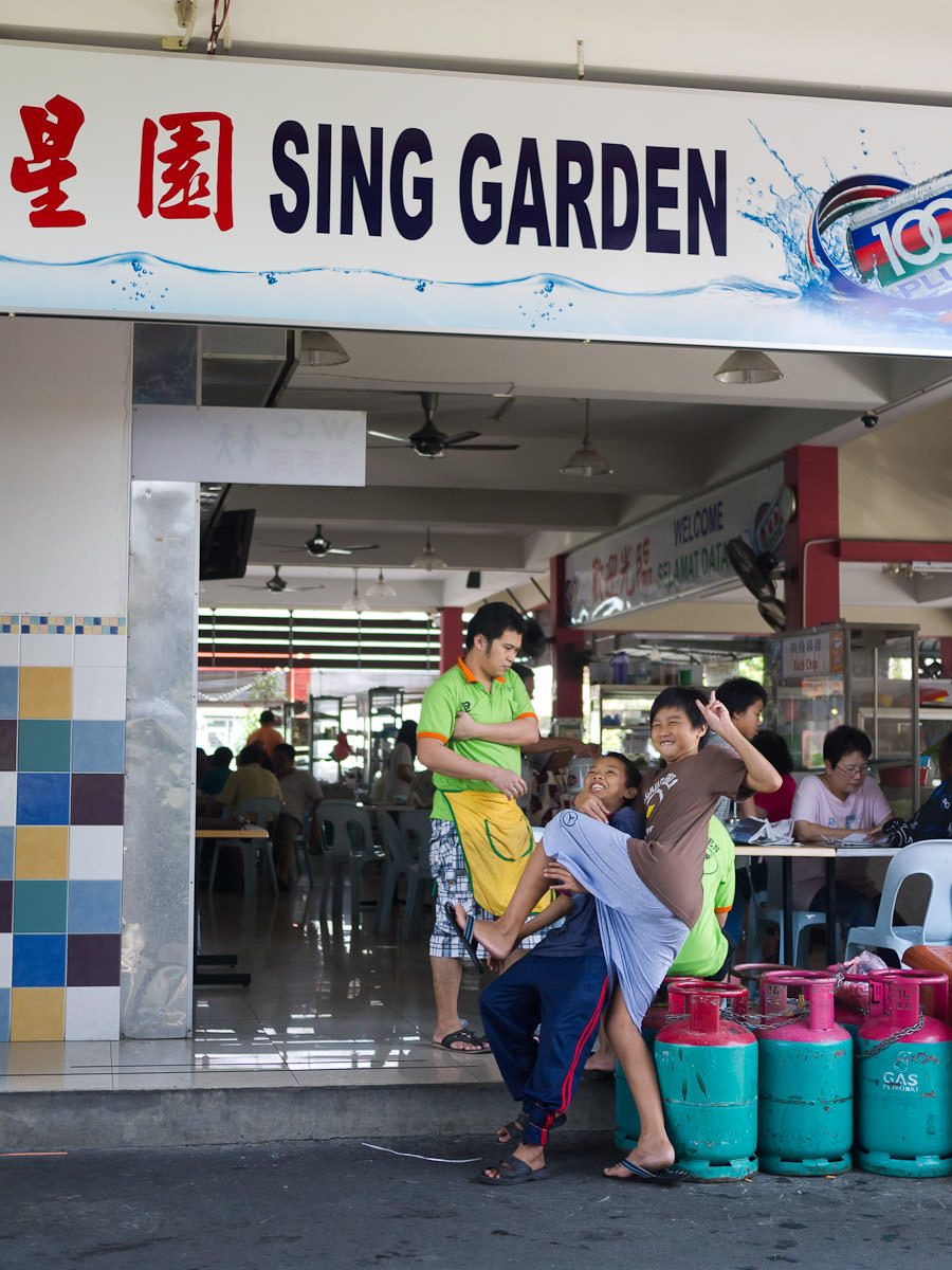 These boys pose for me at the entrance of Sing Garden