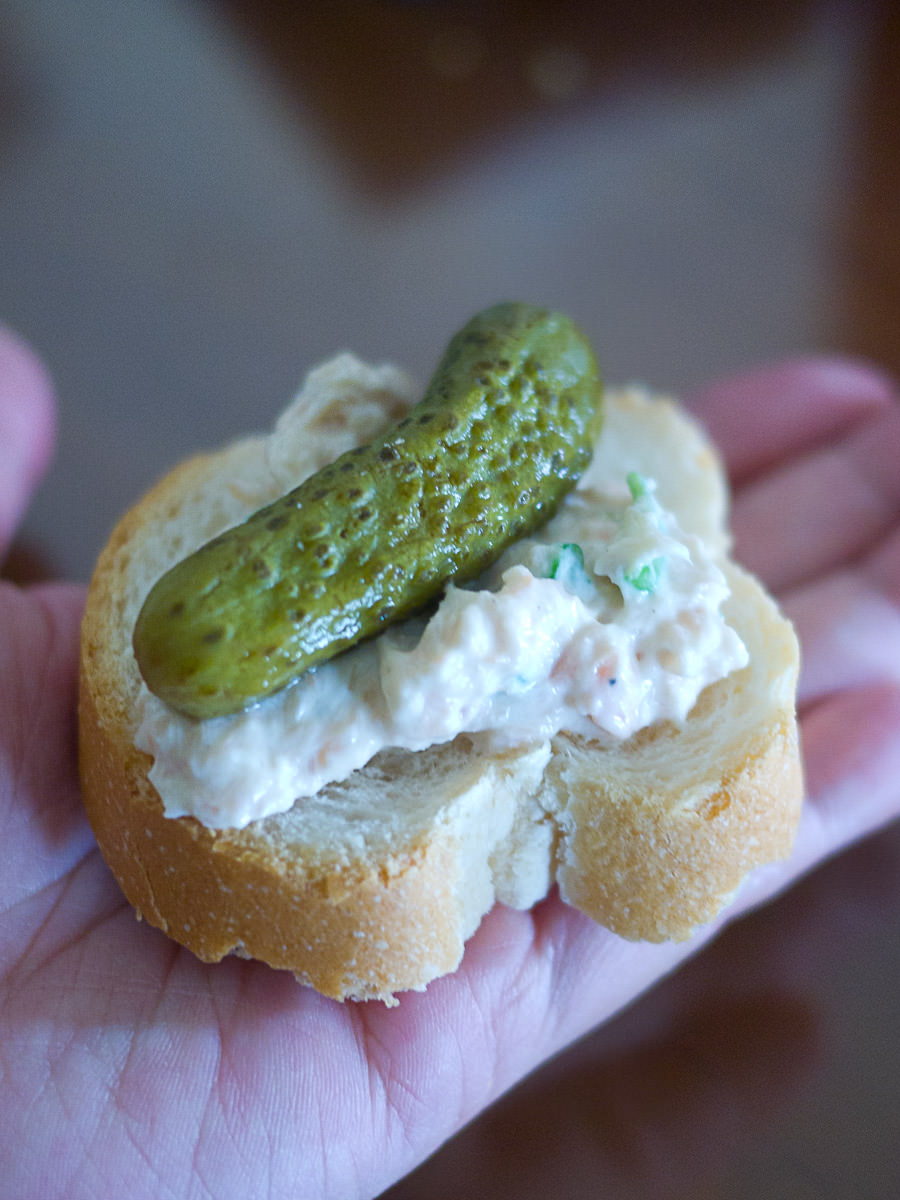 Smoked trout dip and gherkin on fresh bread