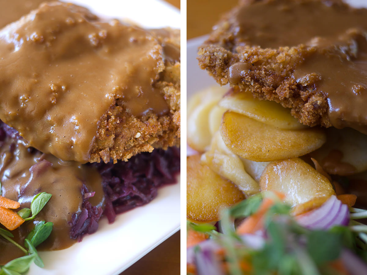 Veal schnitzel topped with creamy mushroom sauce - another angle, served with red cabbage and pan fried potatoes (AU$31)