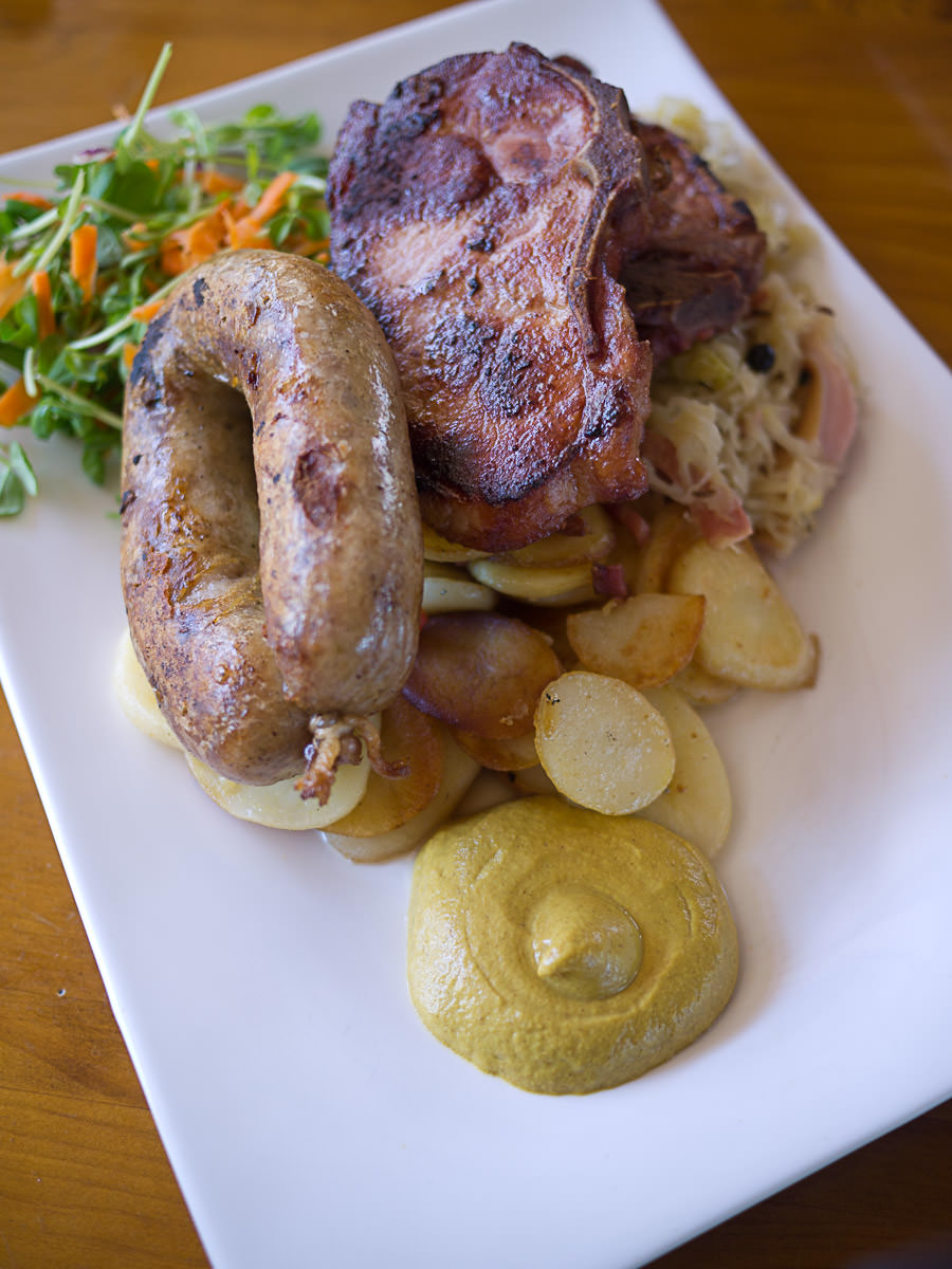 Grill plate: German bratwurst sausage and a smoked cutlet served with panfried potatoes and sauerkraut (AU$31.50)