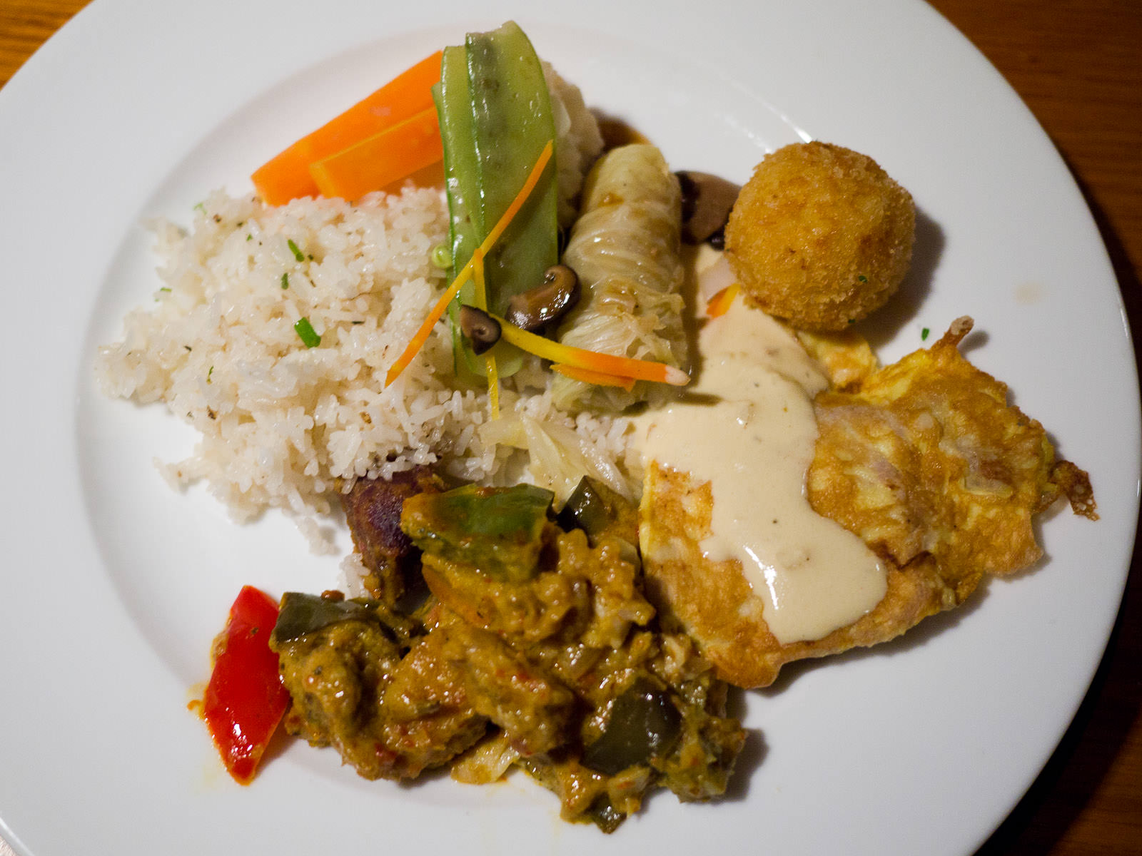 Diner buffet: pork Milanese with potato croquettes, Cambodian fish curry with lemongrass rice, steamed vegetables
