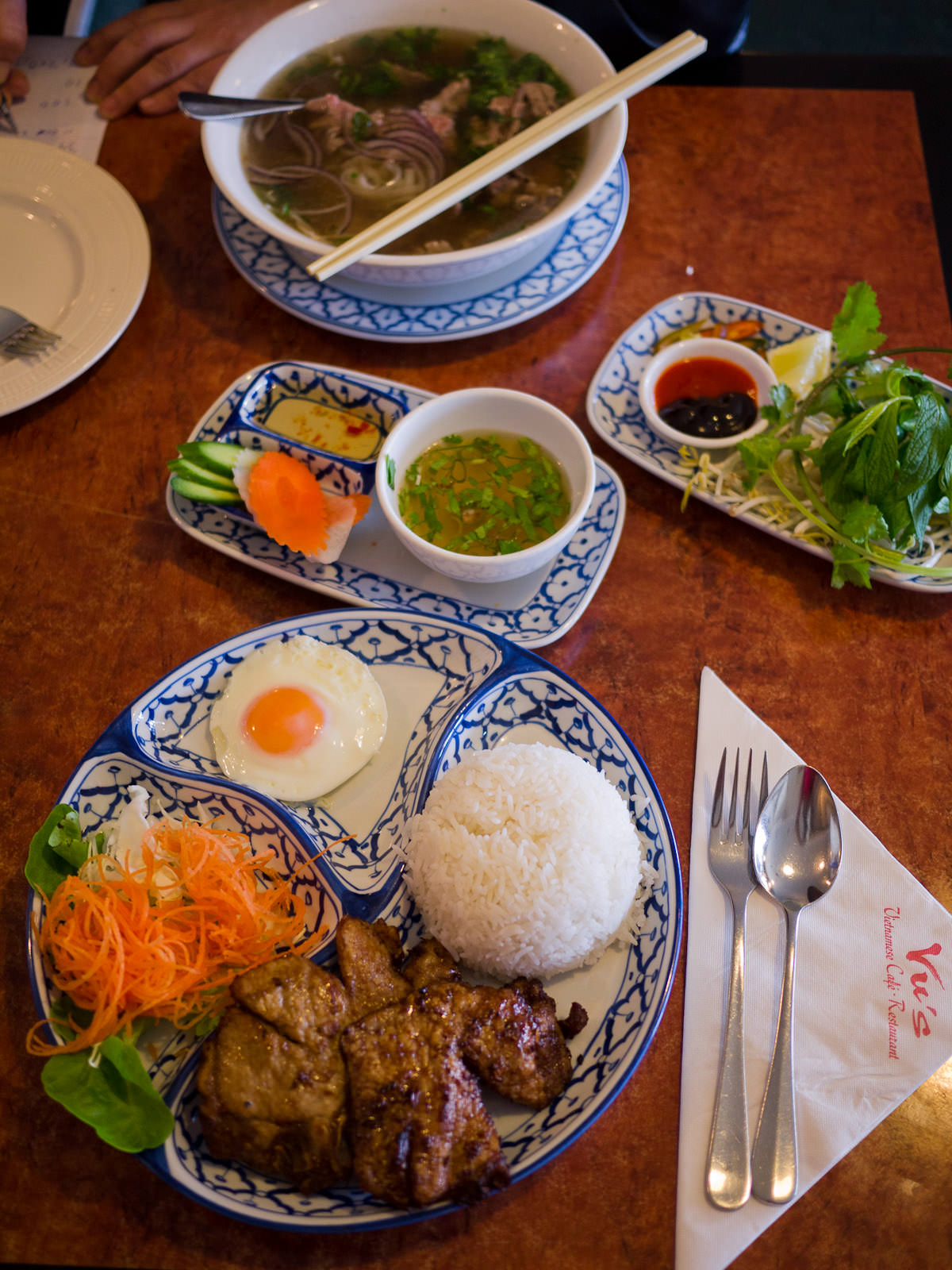 Discussing household finances over Vietnamese lunch