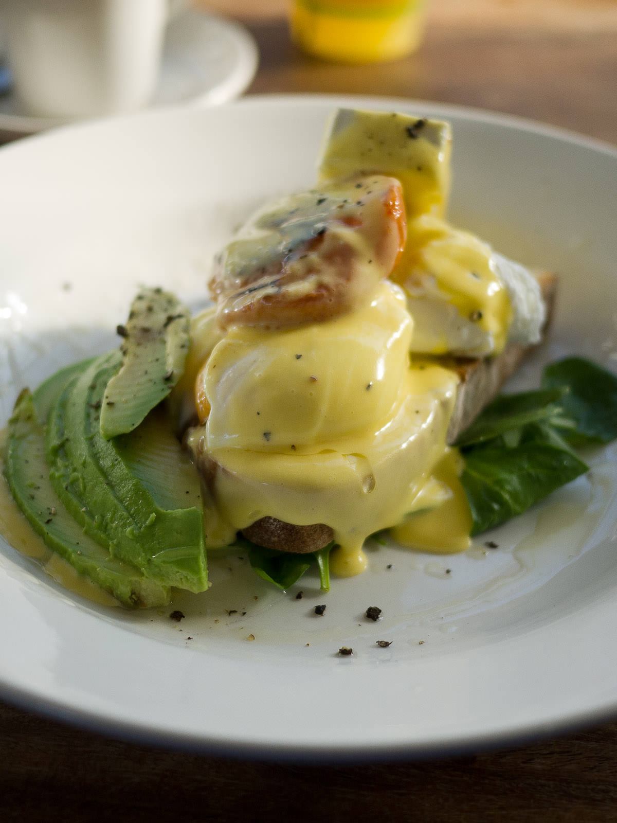 Mediterranean (AU$21) - poached eggs with Roma tomato,  avocado, feta and hollandaise with sourdough