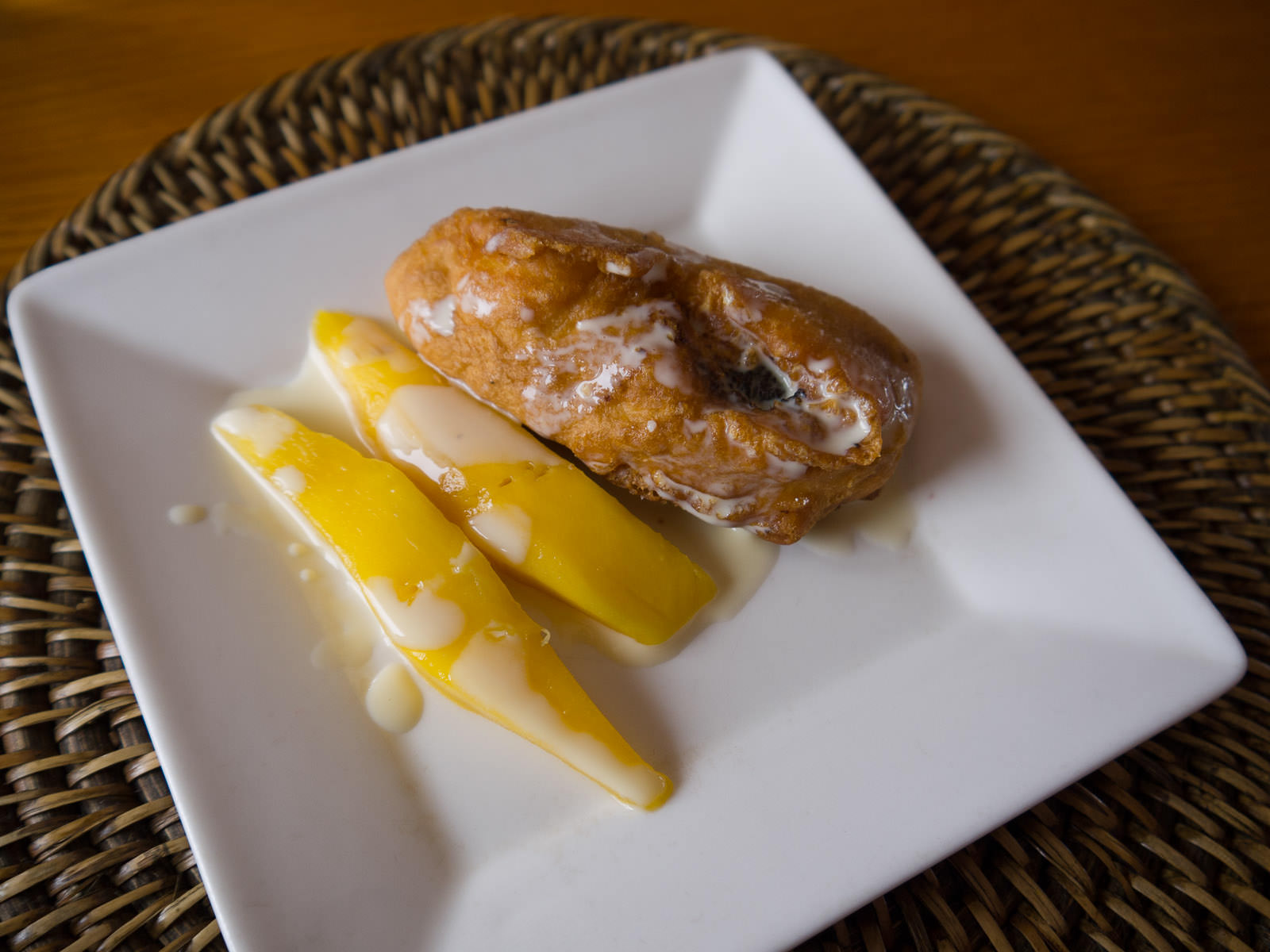 Mango and banana fritter with condensed milk