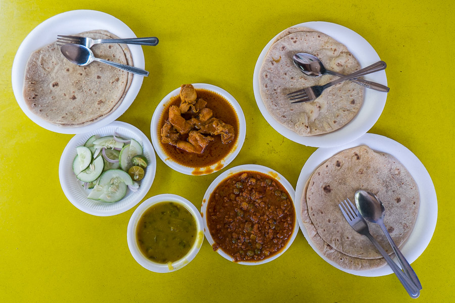 Chapati for three, chicken curry, dal, mutton mince, cucumber salad