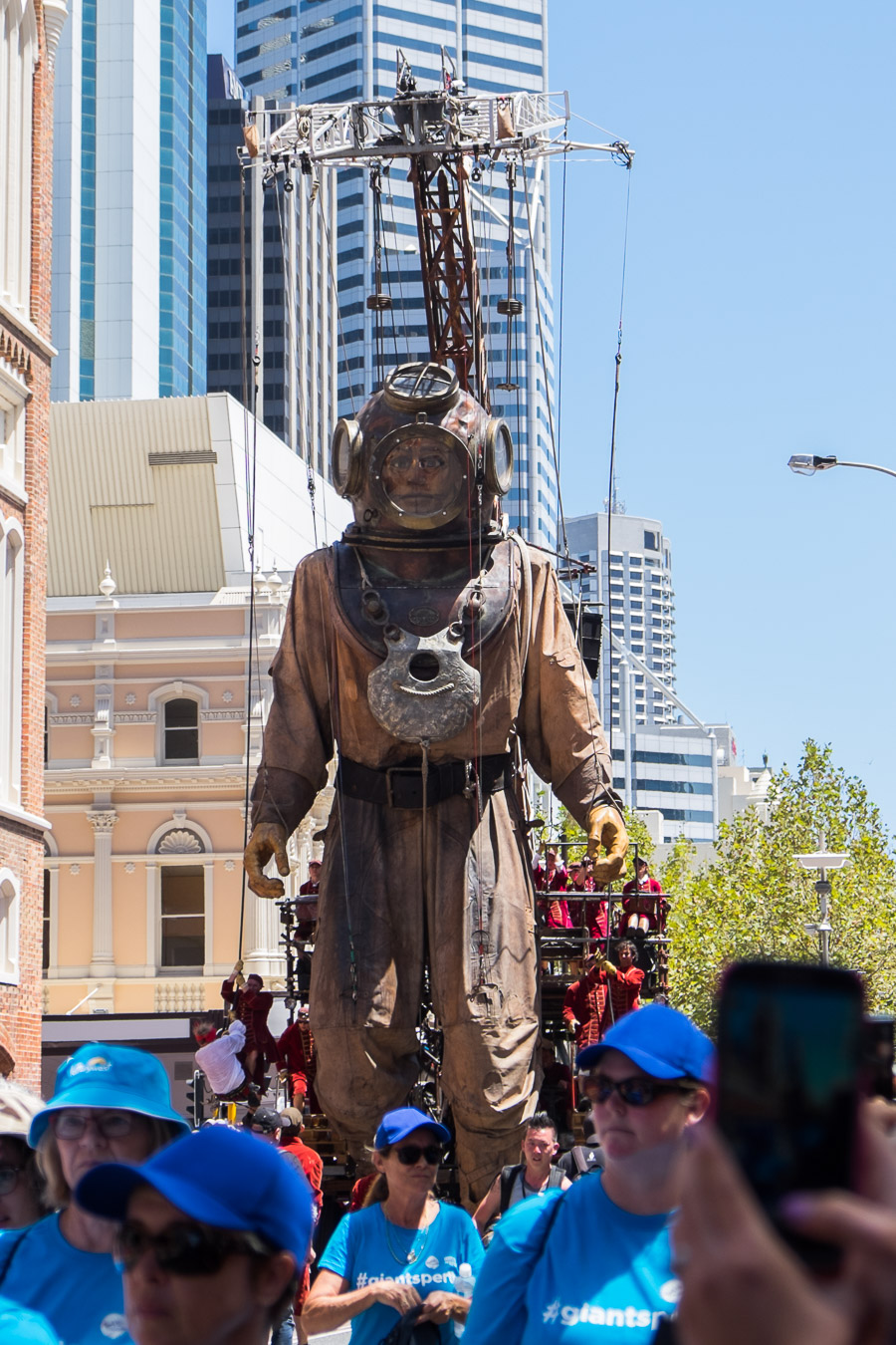 The Diver giant walks down Hay Street on Saturday.