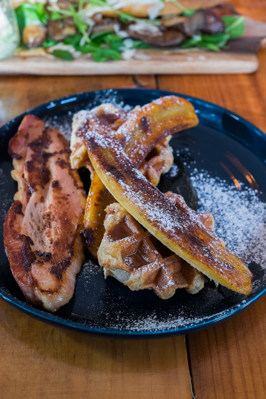 Waffle with caramelised banana and marscapone (medium $12)  with a side of thick cut bacon ($5)