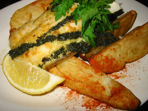 Grilled barramundi with garlic and basil butter