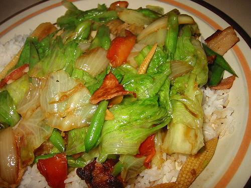 Stir-fried vegetables with leftover bacon and tomato with rice