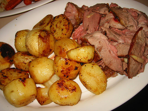 Roast lamb, potatoes and onions