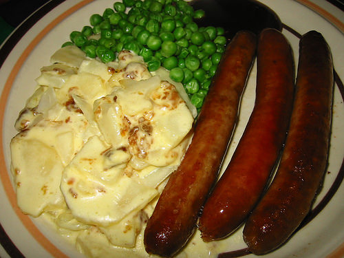 Sausages, peas and potato bake