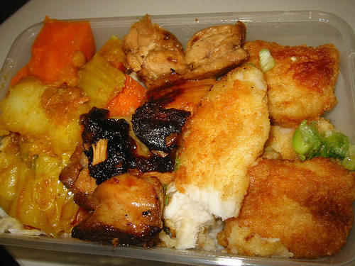 Rice, curried vegetables, Malay chicken and panfried fish