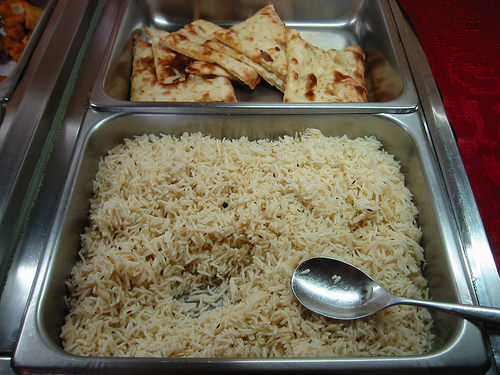 Front: rice, back: butter naan