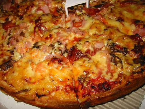 Bacon, mushroom and prawn pizza